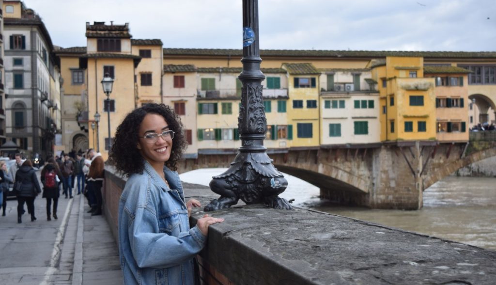 Student in Italy overlooking canals