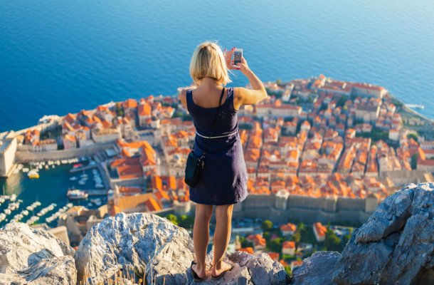 API student taking photo overlooking Dubrovnik