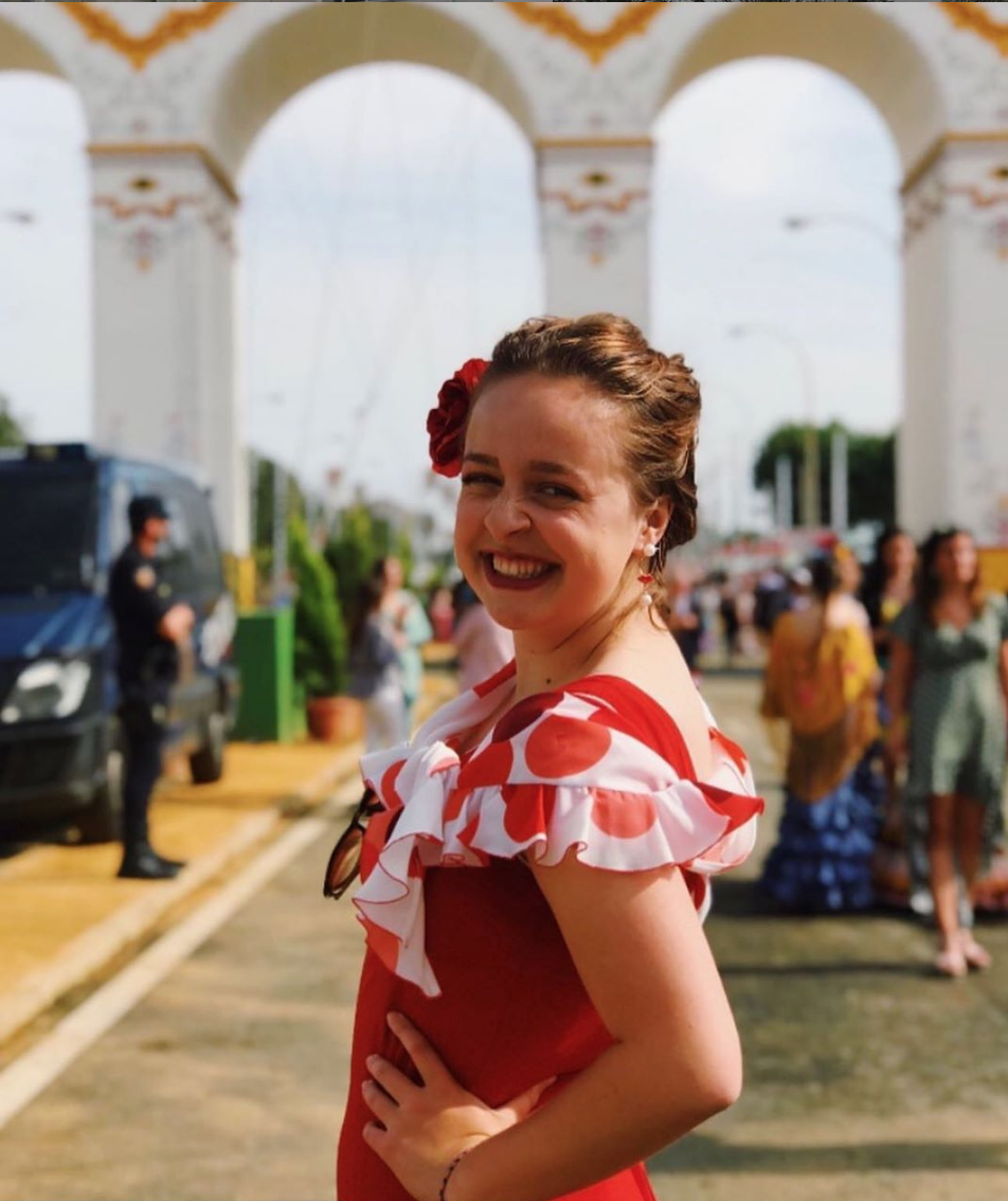 spain-seville-student-smiling-in-flamenco-portrait-mode Experience Seville with API!