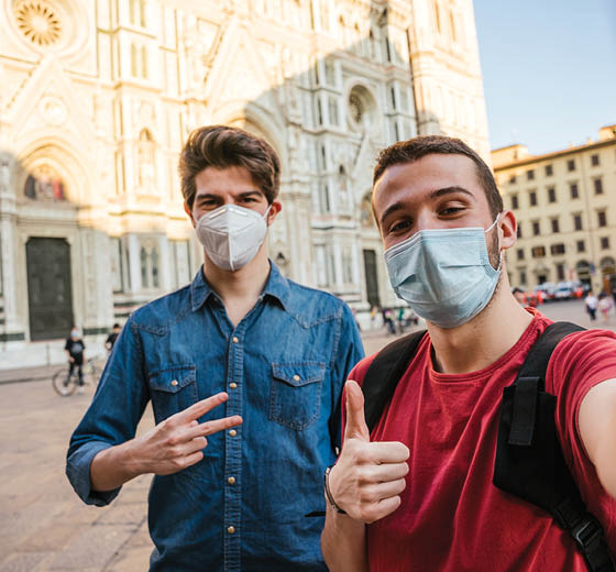 Florence_Italy_Image_1_560x520px Two students wearing masks pose for a selfie in Florence, Italy.